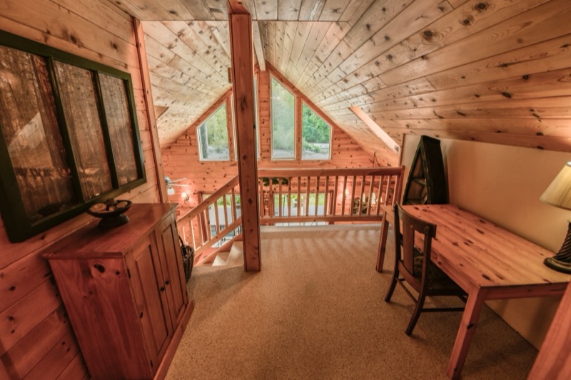 Sitting area in the loft with desk
