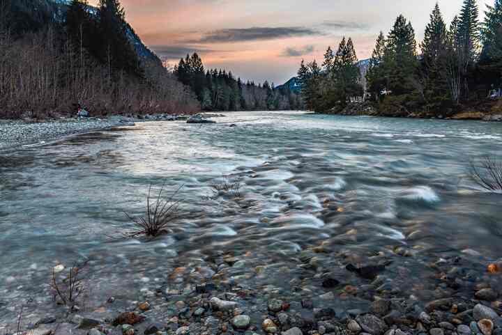The Skykomish River over its rocky bed at sunset